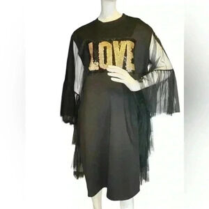 N by Nancy black shirt dress with gold sequins and tulle sleeves details.